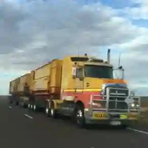 A commercial semi-truck on the road, symbolizing the context of semi-truck related accidents for a legal services section.